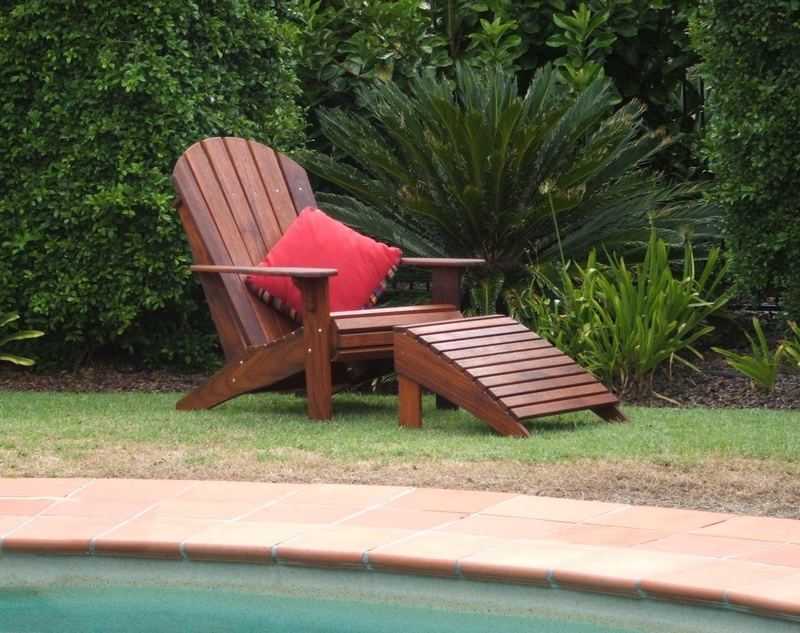 Adirondack chair and footrest on a lawn