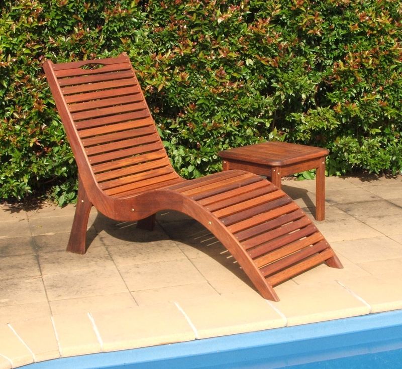 Wave lounger beside a pool