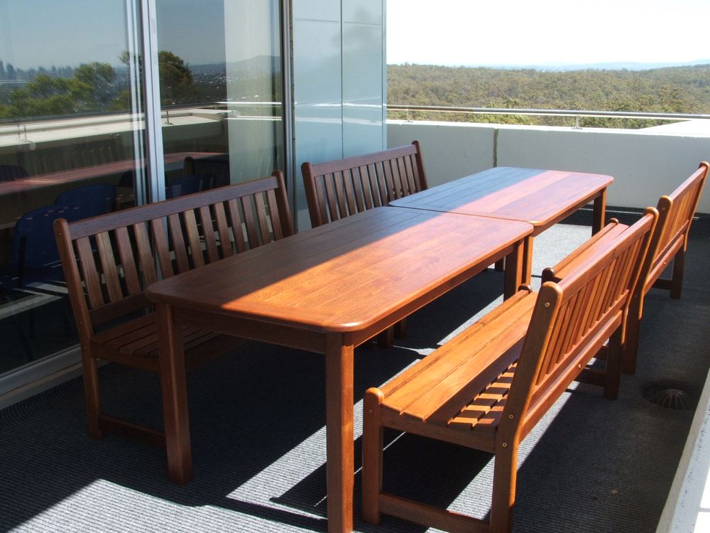 Long Kwila tables and benches on a balcony at Griffith University