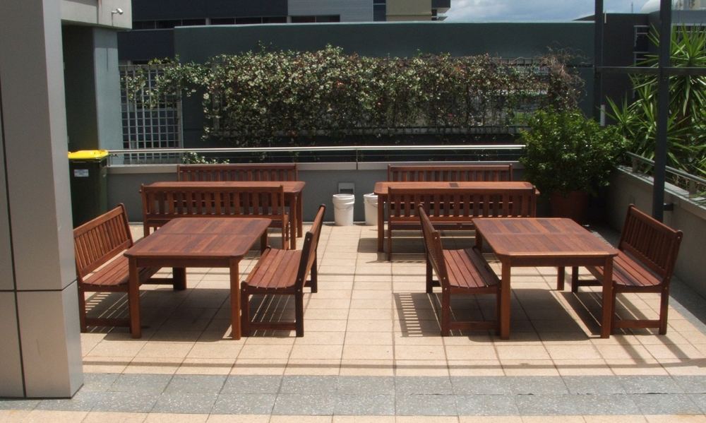 Kwila tables and benches on an office terrace